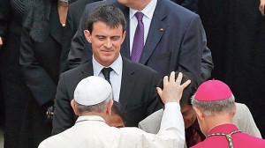 Dignitaries including France's Prime Minister Valls meet Pope Francis after the canonisation ceremony of Popes John XXIII and John Paul II in St. Peter's Square at the Vatican